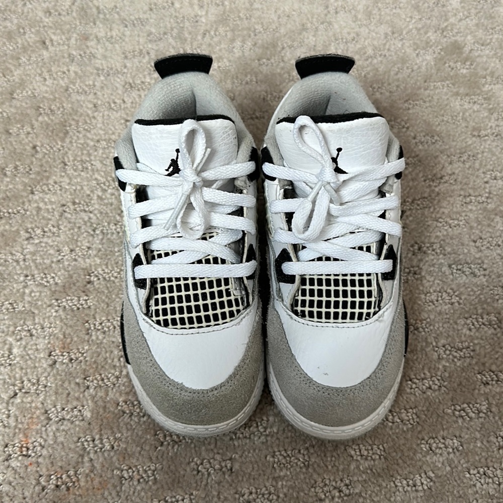 Size 10c Jordan lightly worn. Missing some of shoe